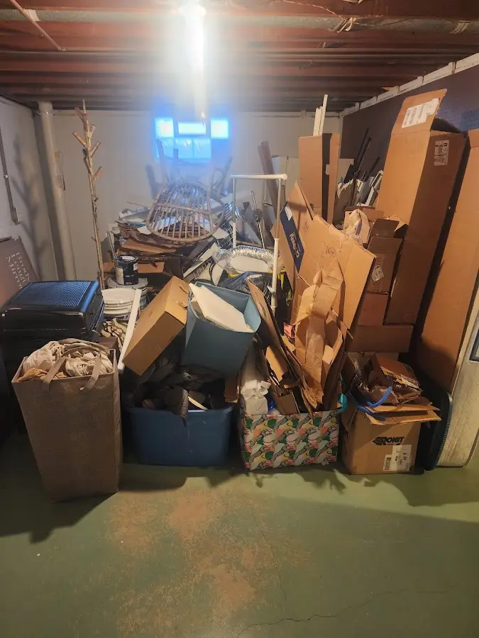 Roll-off dumpster container at job site for 8 Yard Dumpster Rental in Oshtemo